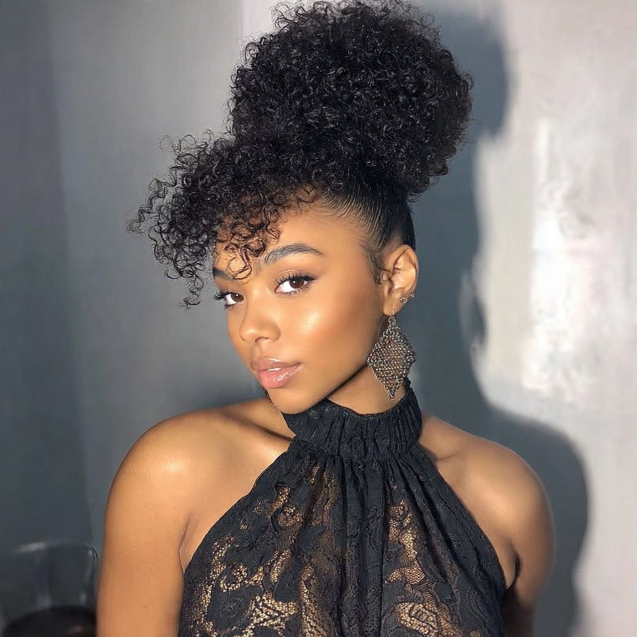 curly high puff hairstyles