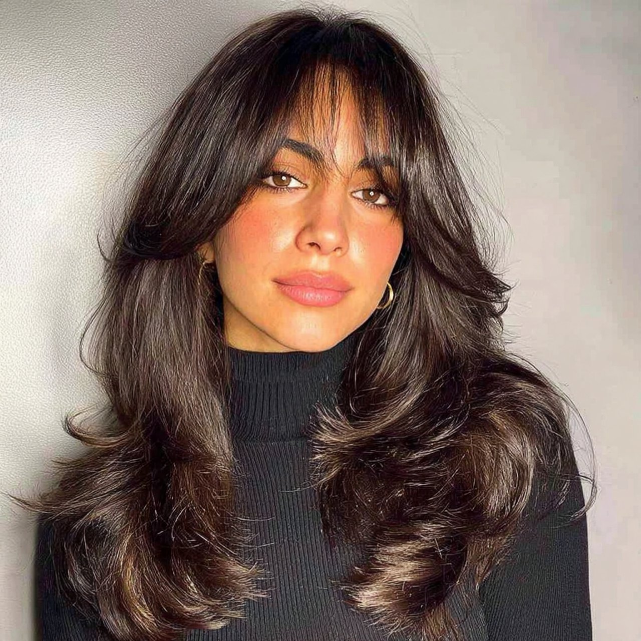 curtain hairbangs with voluminous blowout