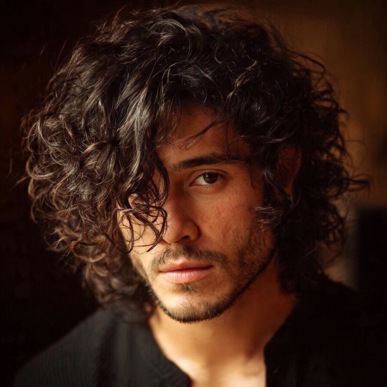 long curly wolf cut hairstyle