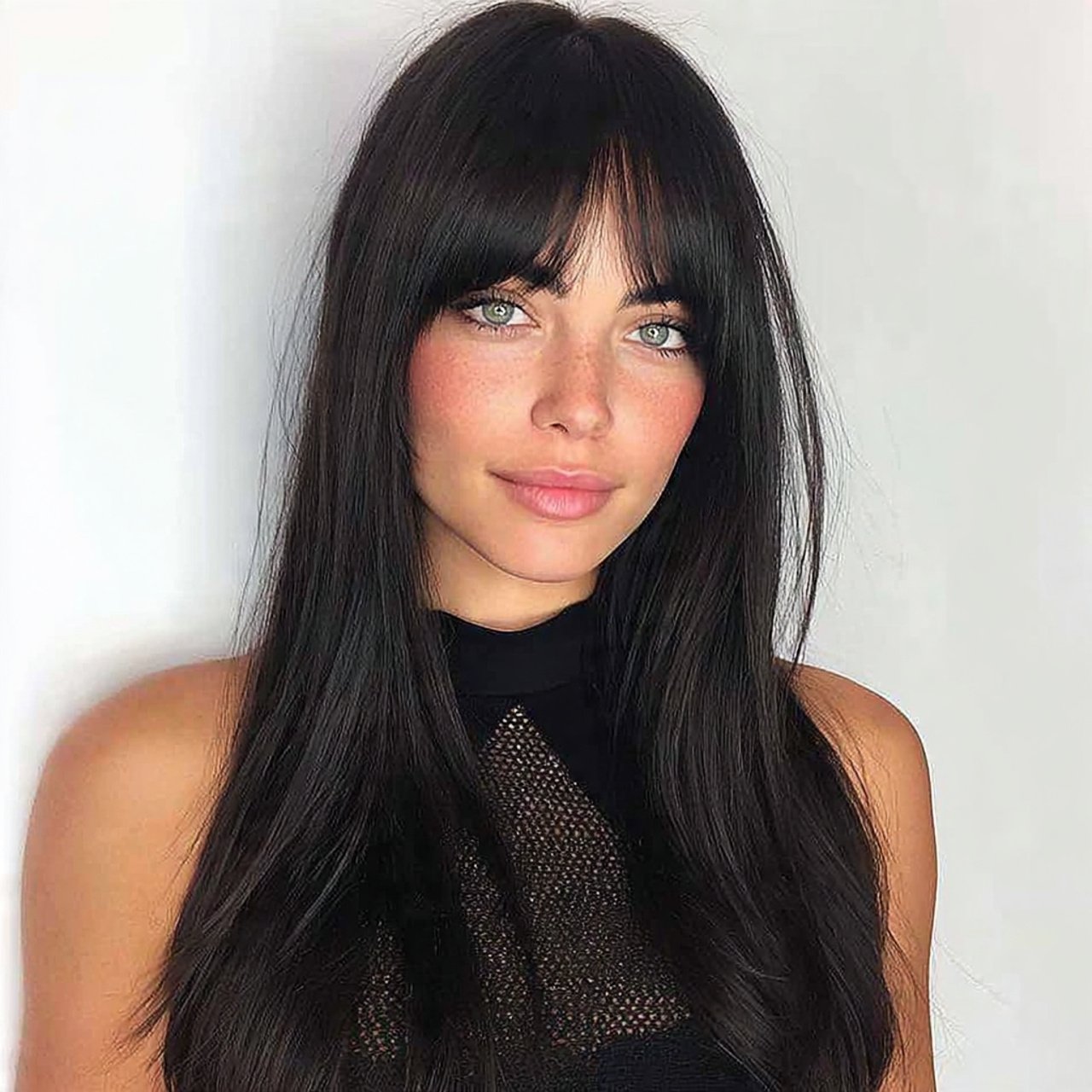 sleek curtain bangs hairstyle