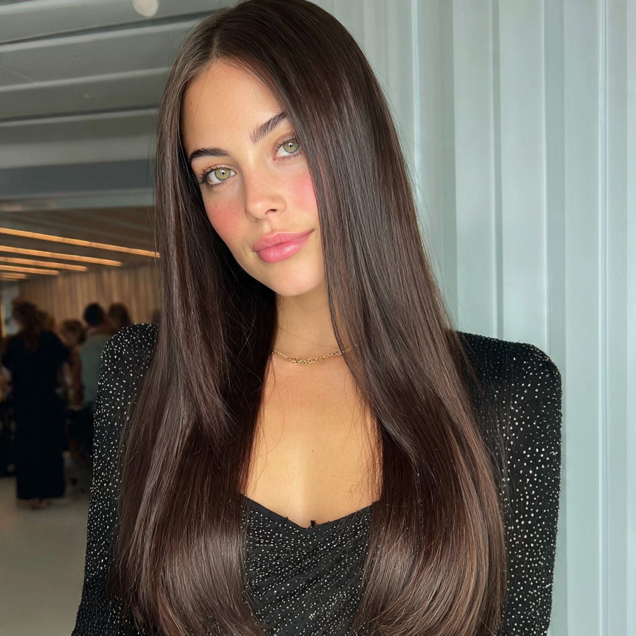 sleek straight hair with middle part for prom hair