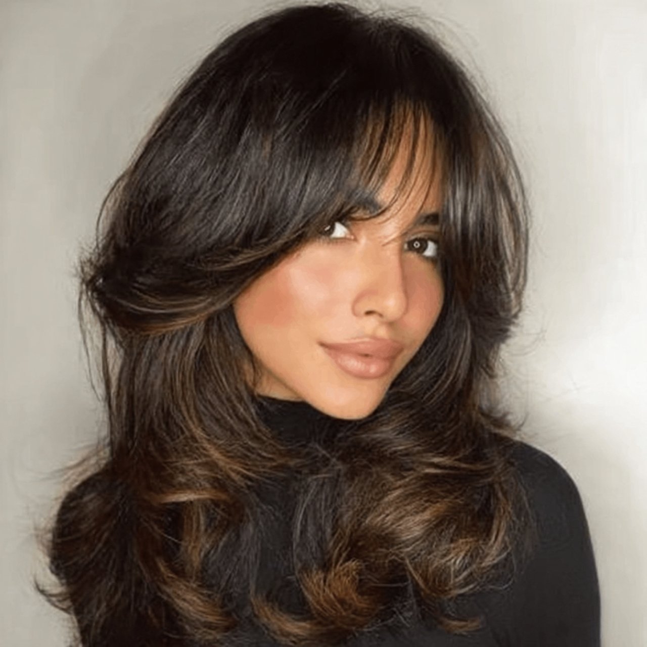 voluminous curtain bangs hairstyle