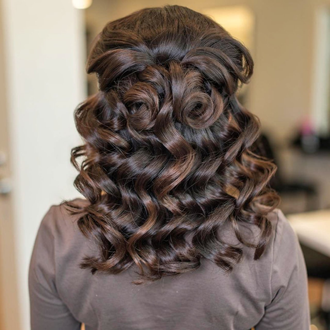 curly volume style prom hairstyle for medium hair