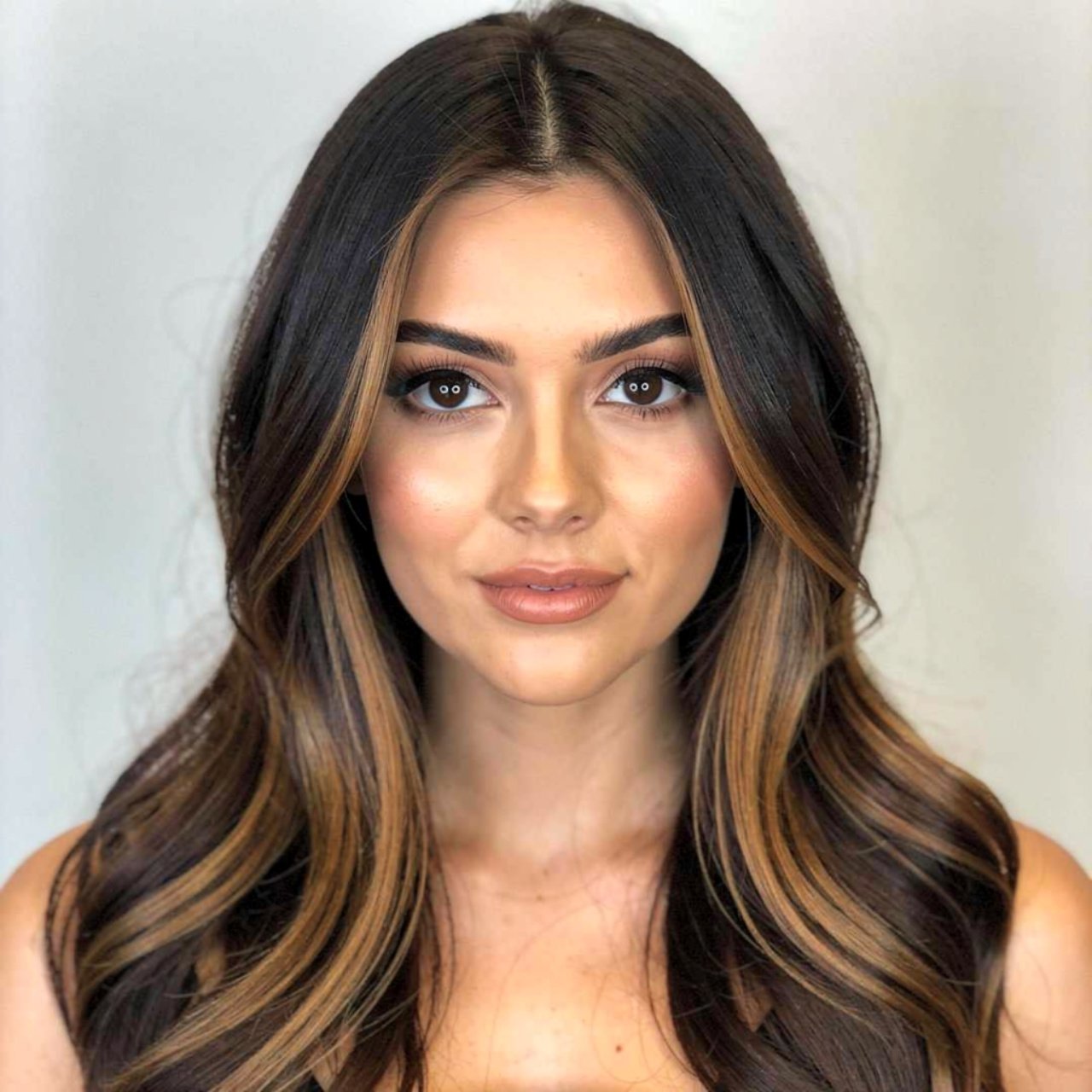 portrait of a woman with chocolate brown balayage