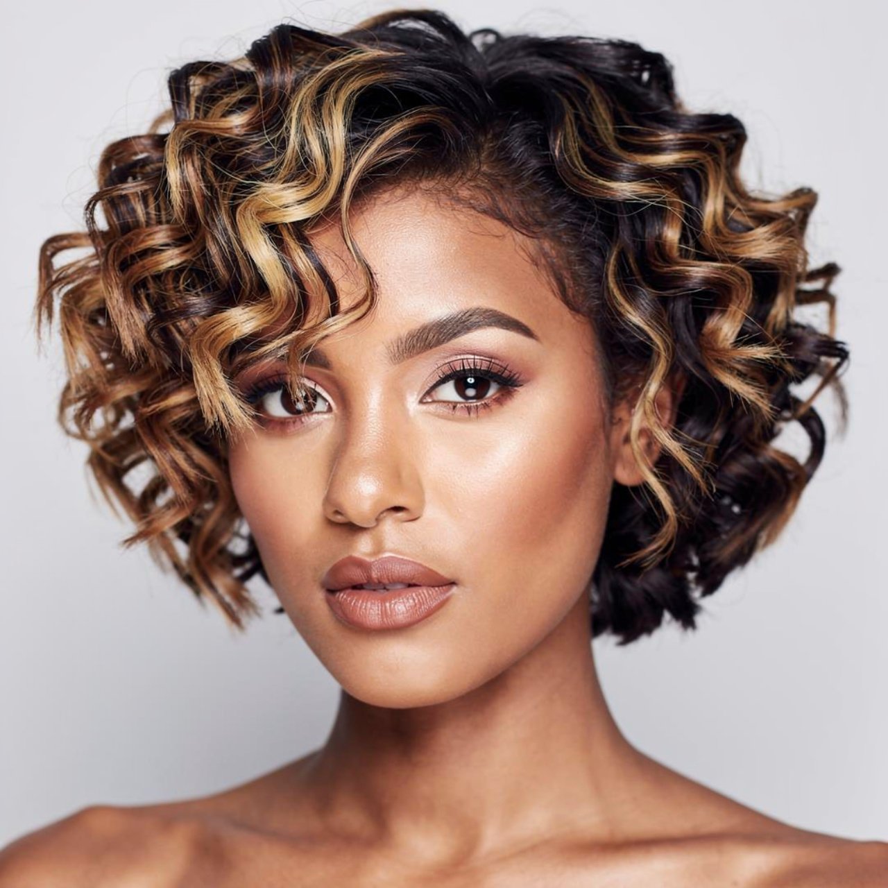 short curly hair with highlighted hairstyles close