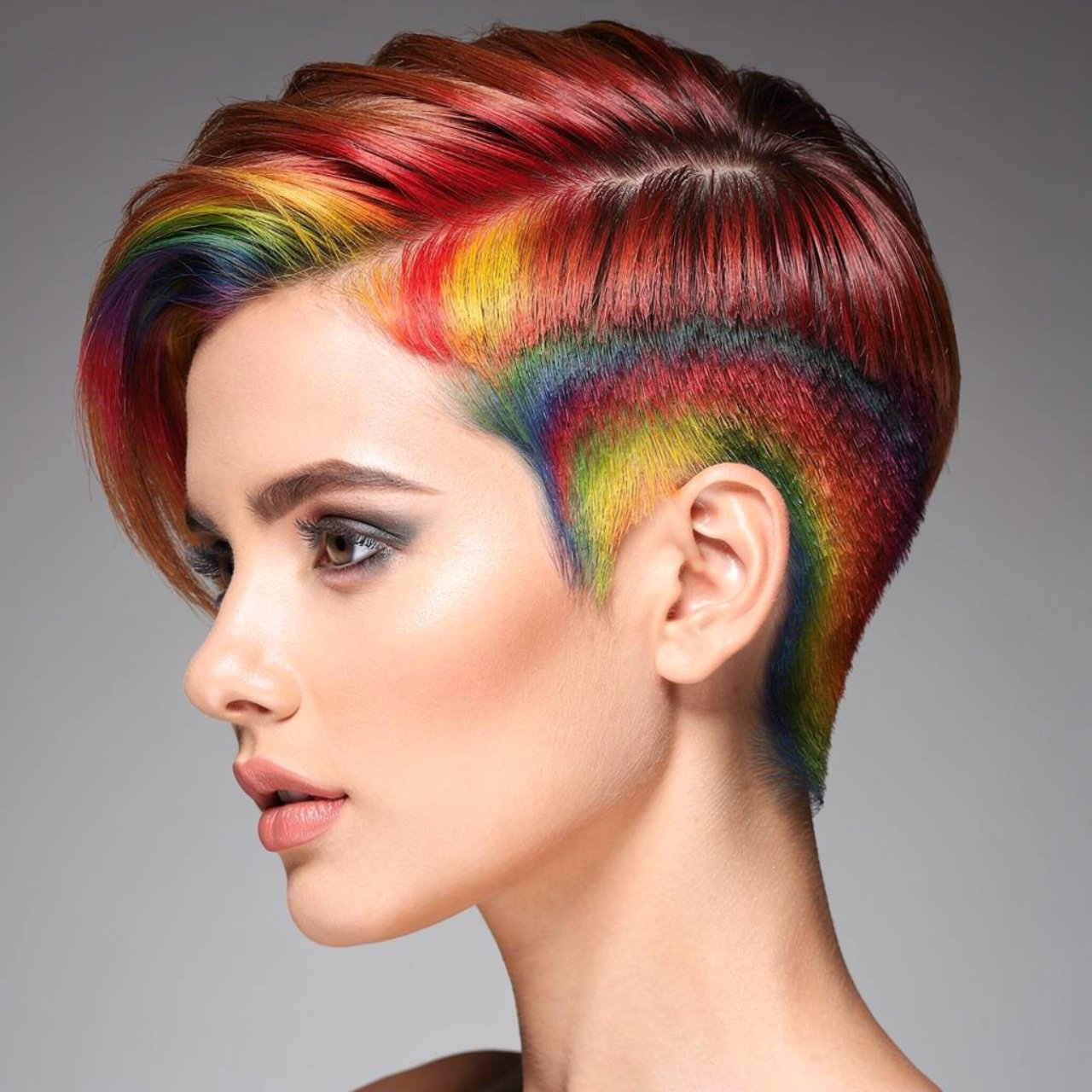 single portrait of a person with rainbow peekaboo