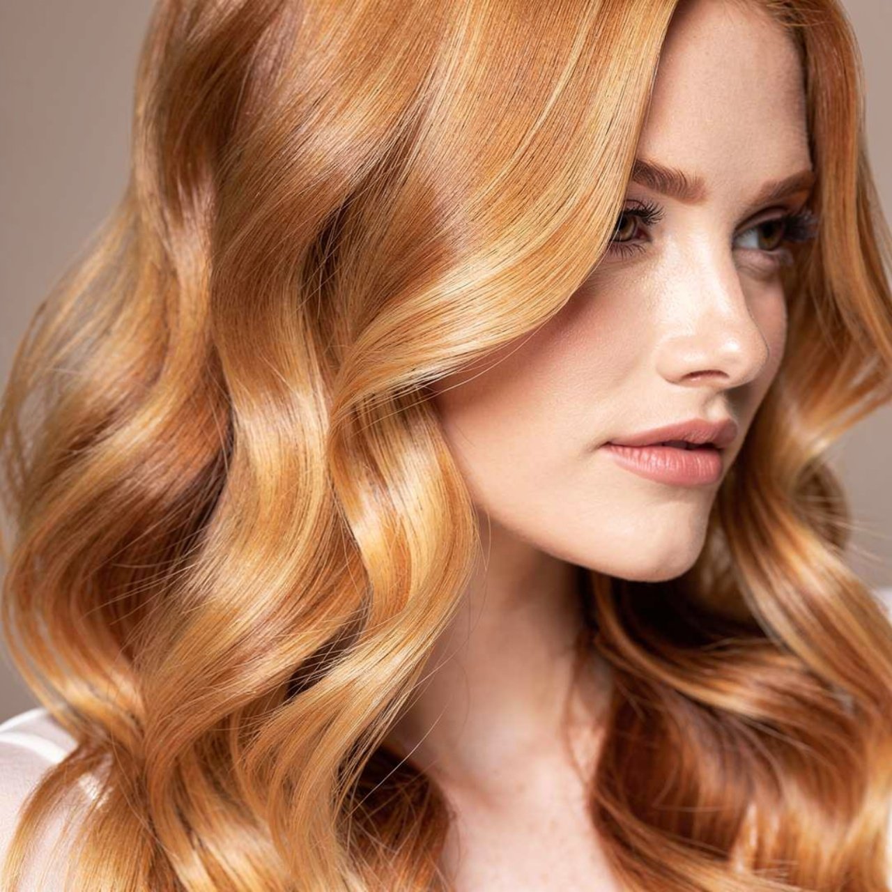 single portrait showcasing strawberry blonde hair