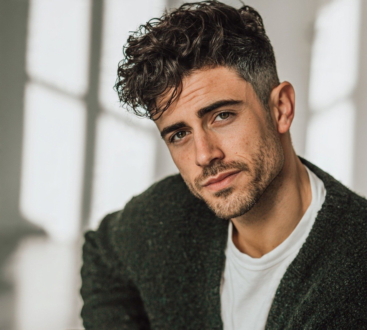Wavy Hairstyles for Men: 15 Stylish Ideas to Try Now 13 12. Wavy Disconnected Undercut Hairstyles For Men