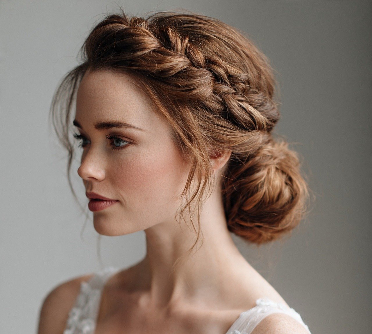 14. Braided Low Bun Wedding Hairstyles