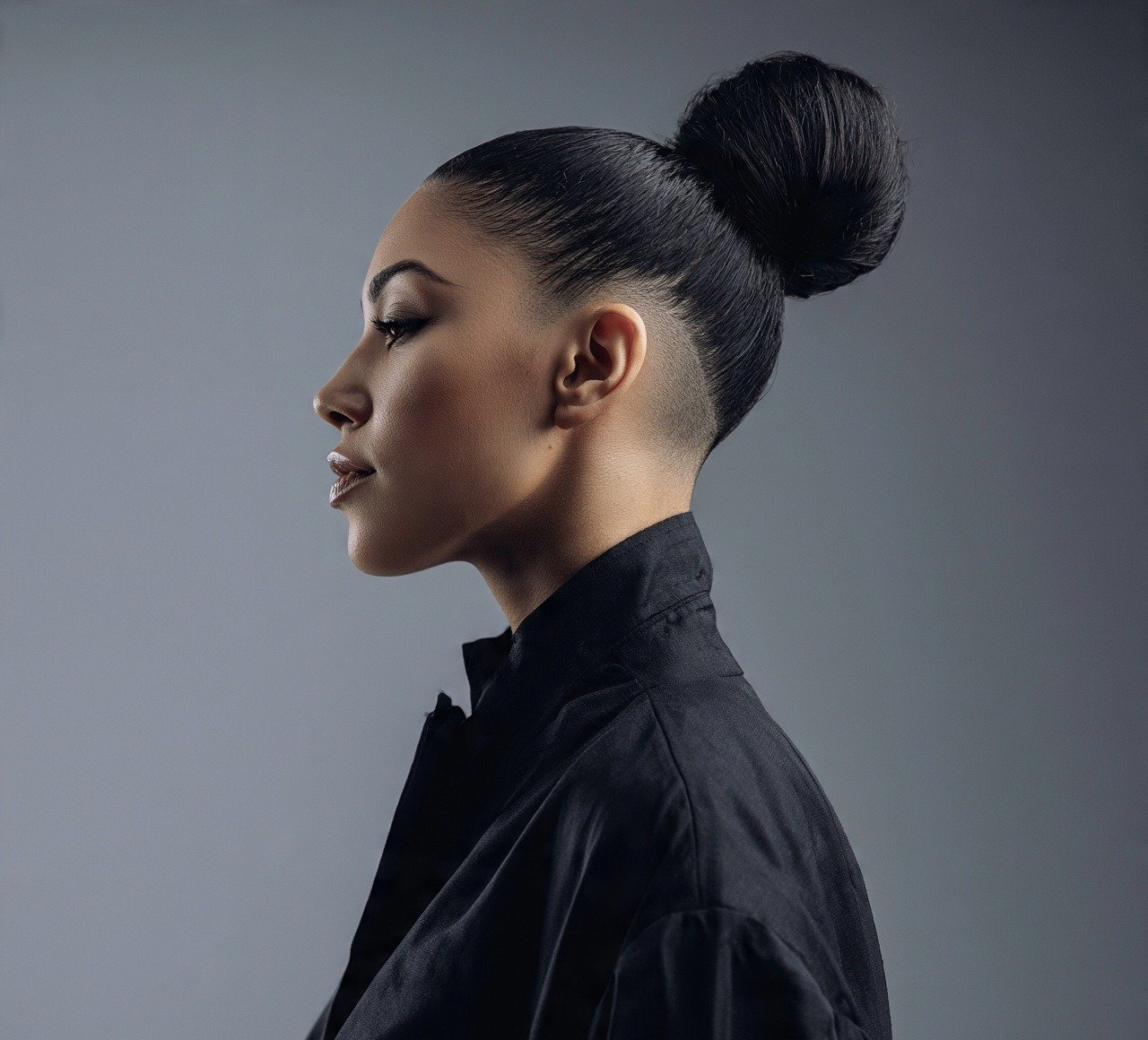 14. Low Fade Into High Bun Hairstyles