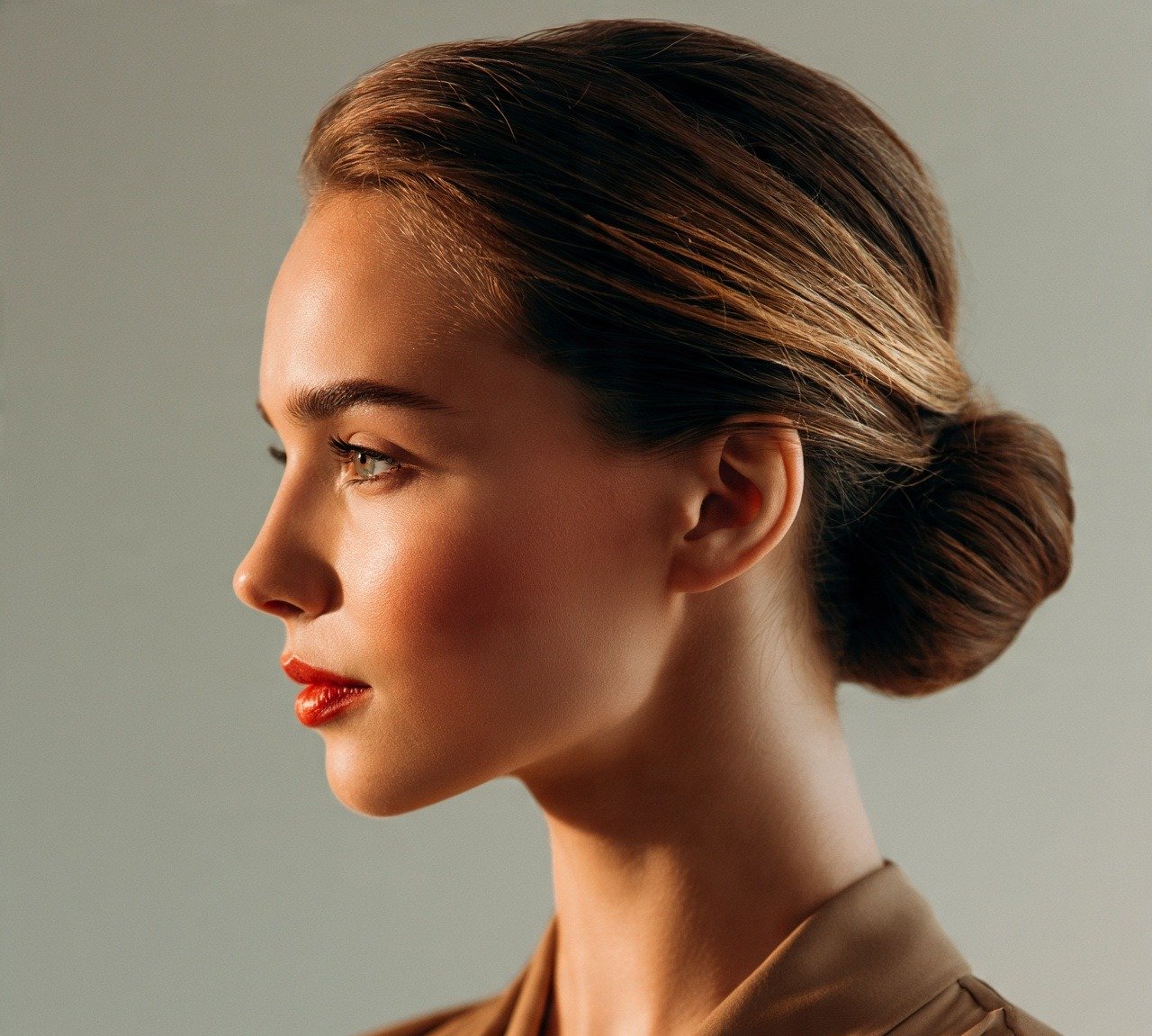 Updo Hairstyles For Short Hair: 15 Trendy Ideas That Turns Heads 3 2. Sleek Low Chignon Updo Hairstyles For Short Hair