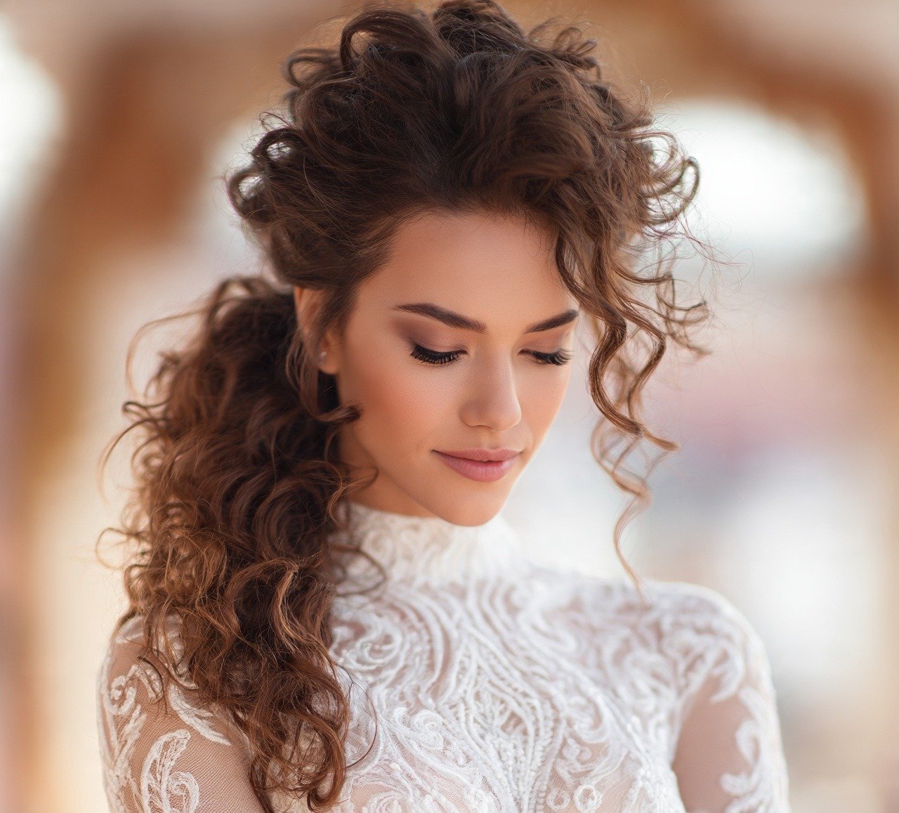 7. Loose Curly Ponytail Wedding Hairstyles for Curly Hair