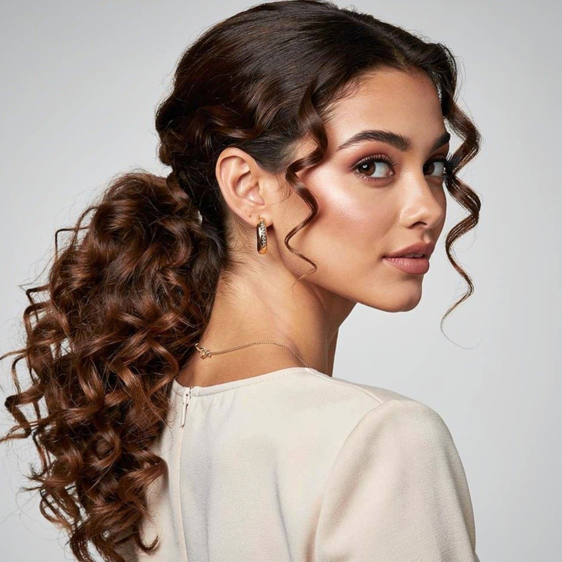 15 Trending Simple Curly Hairstyles That Are Easy and Beautiful 8 Low Curly Ponytail