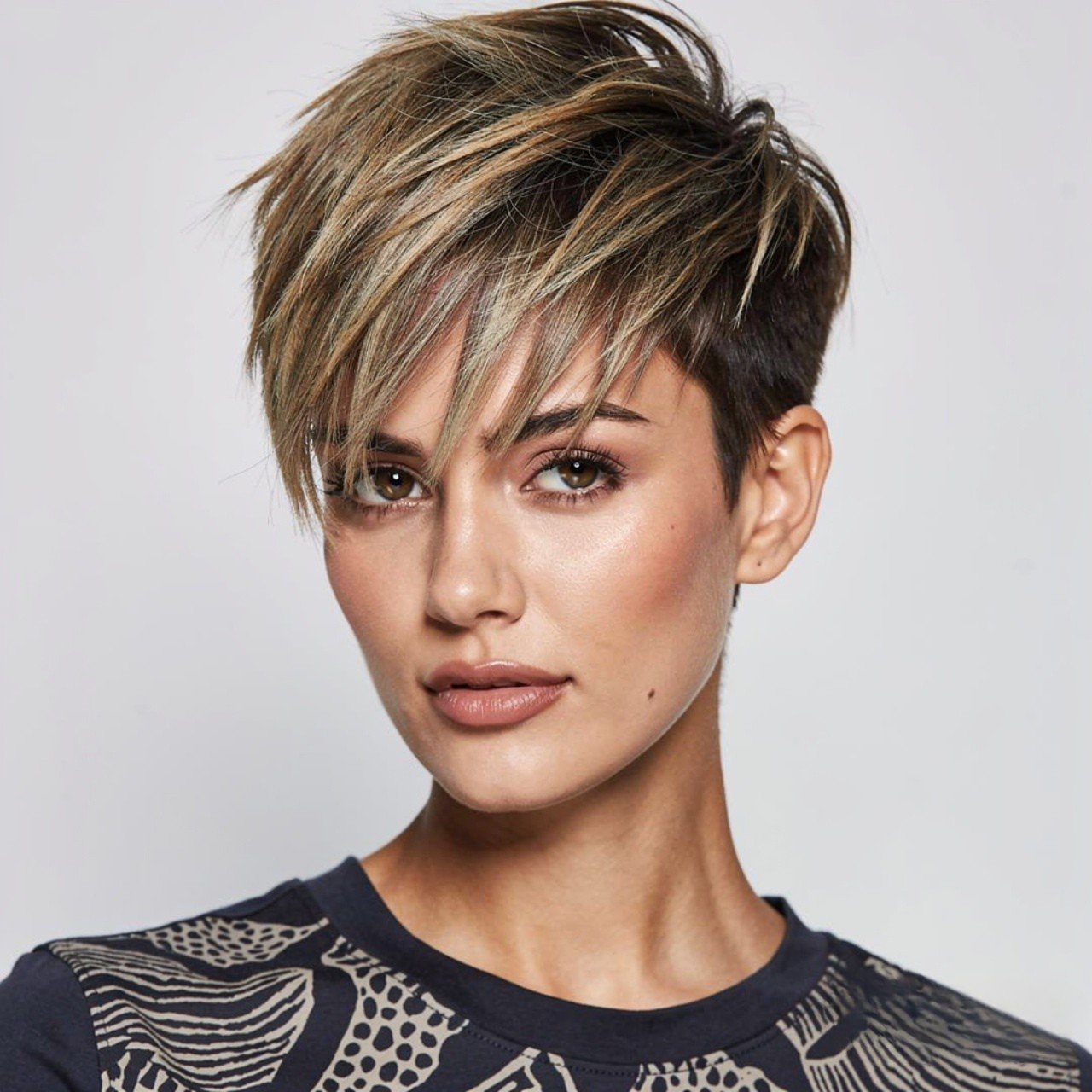 Hairstyles for Short Hair with Bangs: 15 Trendy Ideas that You'll Love 3 Textured Pixie with Wispy Bangs Hairstyle for Short Hair