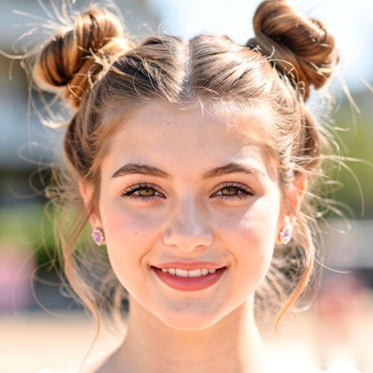 14 Trendy Cute Summer Hairstyles that You’ll Love 5 half up space buns cute summer hairstyle square si