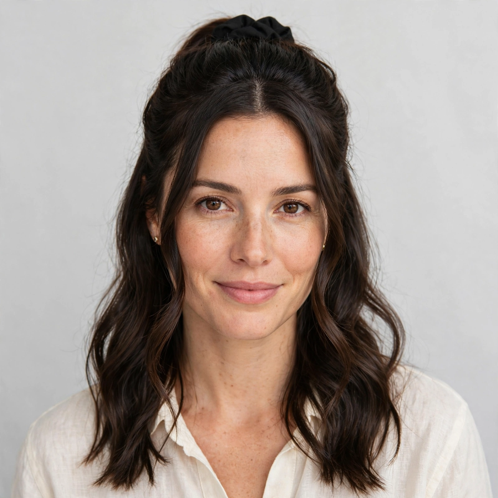 15 Trending Simple Hairstyles For Long Hair That Look Effortlessly Chic 5 half up studio portrait 1