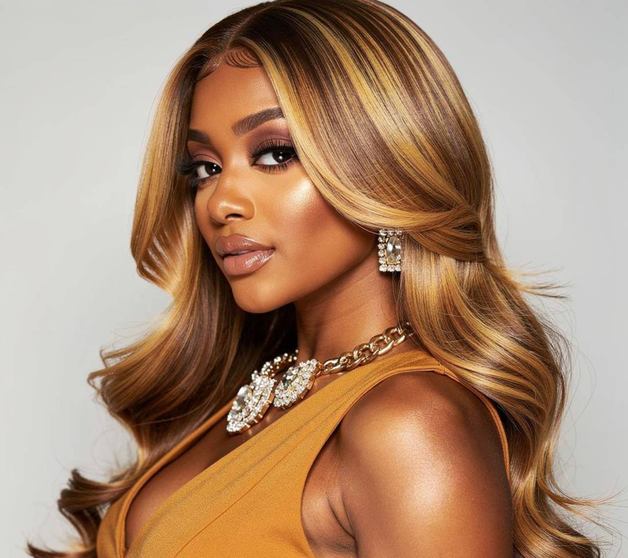 honey blonde quick weave hairstyle for warm skin