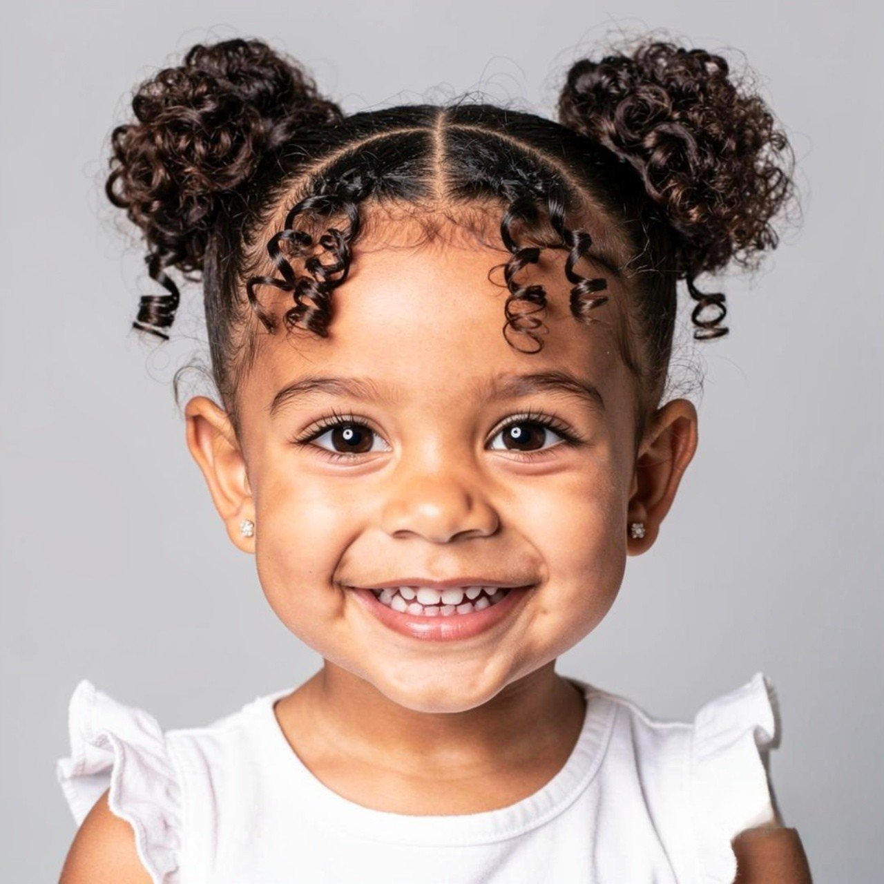Hairstyles for Short Hair Kids: 15 Trendy Ideas that You’ll Love 11 single image of a child with short curly hair styl