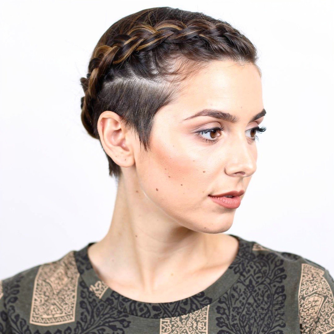 square portrait of a woman with short hair styled