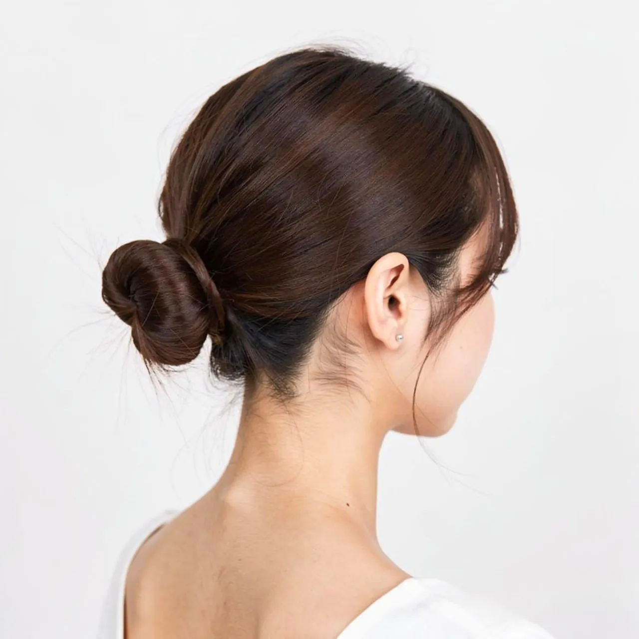 Hairstyles for Short Hair for School: 15 Trendy Ideas that You’ll Love 10 low mini bun hairstyle for short hair suitable for