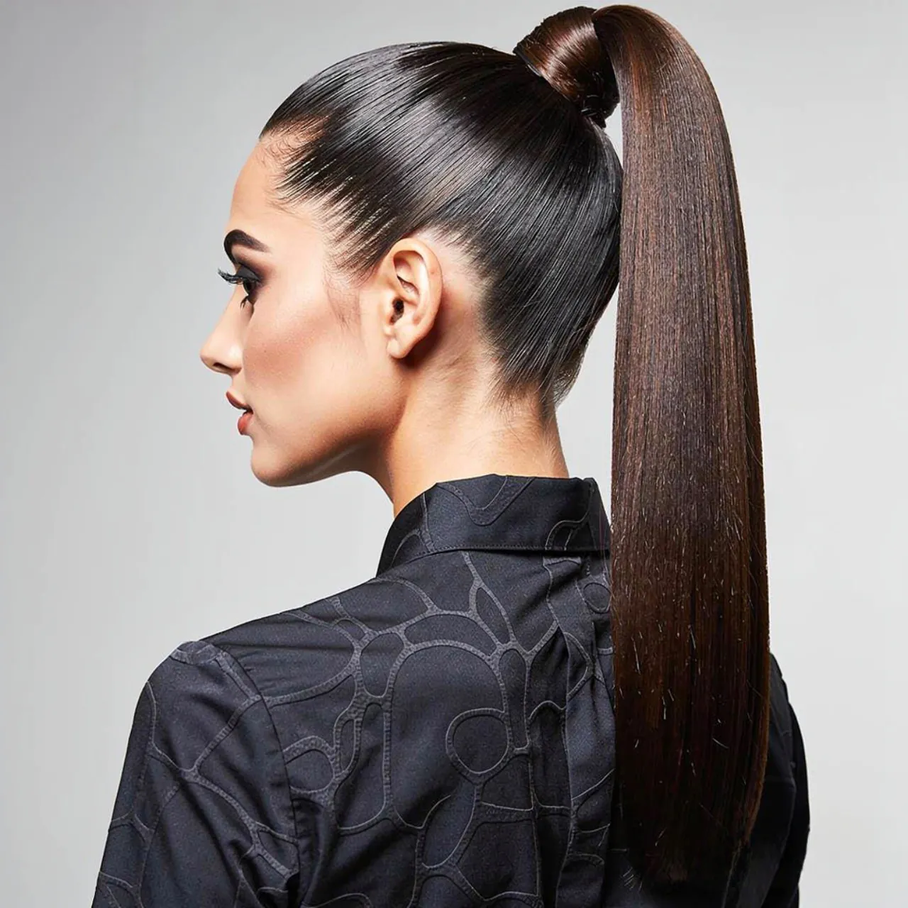 Fancy Ponytail Hairstyles: 15 Trendy Ideas that You’ll Love 2 square portrait of a woman with a sleek high fancy