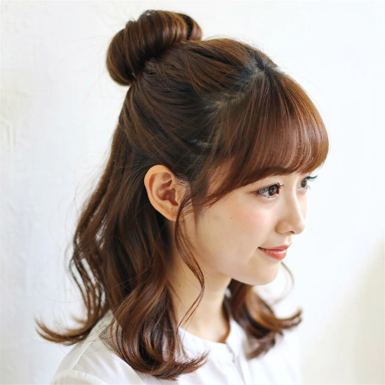 half up bun school hairstyle for medium hair neat 1 1